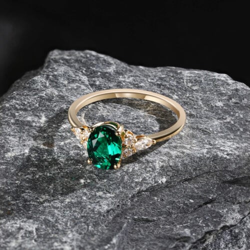 Pattiring Oval Cut Emerald White Gold Cluster Engagement Ring