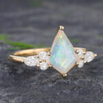 Pattiring Kite Shaped Opal Yellow Gold Cluster Engagement Ring