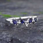 Pattiring Marquise Cut Blue Sapphire & Diamond White Gold Curved Wedding Band
