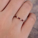 Pattiring Marquise Cut Garnet Rose Gold Half Eternity Wedding Band