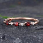 Pattiring Marquise Cut Garnet Rose Gold Half Eternity Wedding Band