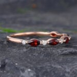 Pattiring Marquise Cut Garnet Rose Gold Half Eternity Wedding Band