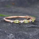 Pattiring Marquise Cut Peridot Rose Gold Half Eternity Wedding Band