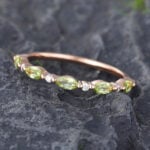 Pattiring Marquise Cut Peridot Rose Gold Half Eternity Wedding Band