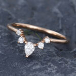 Pattiring Pear Shaped Moissanite Rose Gold Curved Wedding Band