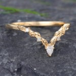 Pattiring Pear Shaped Moissanite Yellow Gold Curved Wedding Band