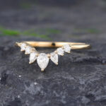 Pattiring Pear Shaped Moissanite Yellow Gold Curved Wedding Band