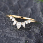 Pattiring Pear Shaped Moissanite Yellow Gold Curved Wedding Band