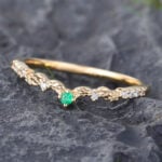 Pattiring Unique Emerald & Moissanite Yellow Gold Curved Wedding Band