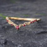 Pattiring Unique Ruby Yellow Gold Curved Wedding Band