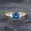 Pattiring Hexagon Cut London Blue Topaz Yellow Gold Engagement Ring