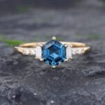 Pattiring Hexagon Cut London Blue Topaz Yellow Gold Engagement Ring