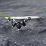 Pattiring Pear Shaped Black Onyx White Gold Curved Wedding Band