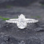 Pattiring 1.5 Carat White Gold Pear Shaped Moissanite Engagement Ring