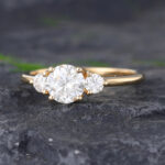 Pattiring Three Stones Yellow Gold Moissanite Engagement Ring 1