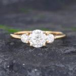 Pattiring Three Stones Yellow Gold Moissanite Engagement Ring