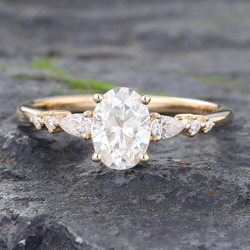 Oval Cut Moissanite Engagement Ring with Pear Accented