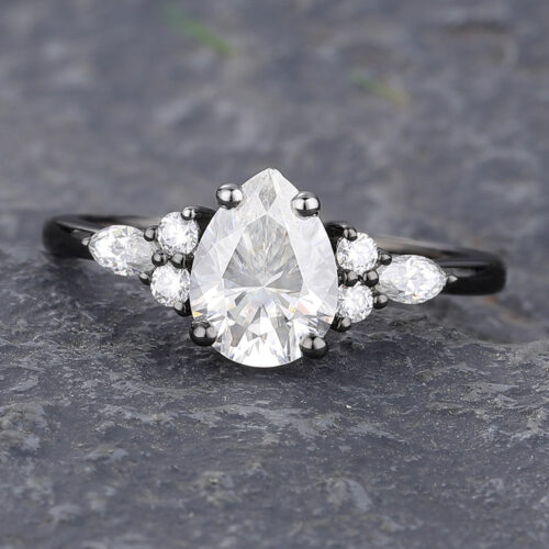 A wedding ring inlaid with several small diamonds and a large diamond as the main stone