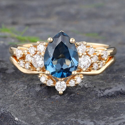 Pear Cut London Blue Topaz Engagement Ring Set with Sparkling Cluster