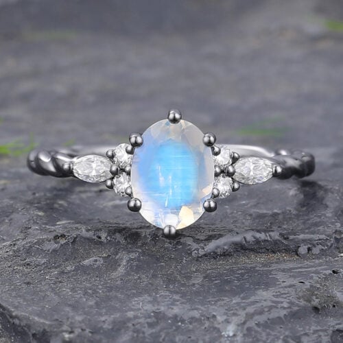 Oval Cut Moonstone Engagement Ring with Twisted Band & Moissanite Cluster